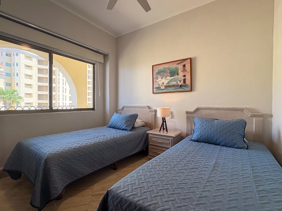 Bedroom 3 with two single beds